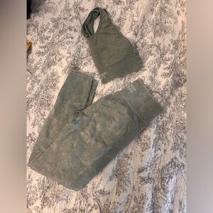 Pink seamless leggings and bra. Size S. Pink logo on bra is faded (pictured)